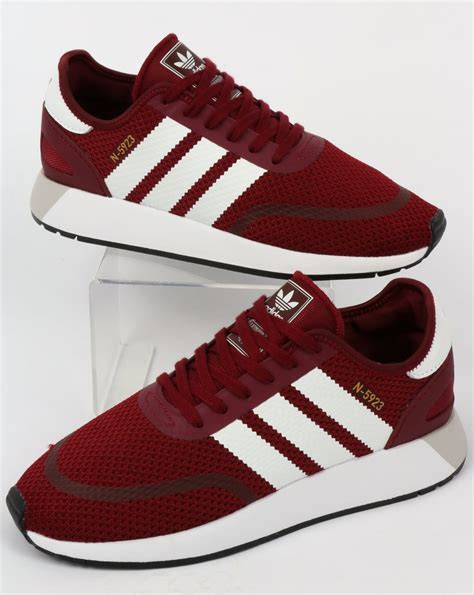 burgundy and white adidas.